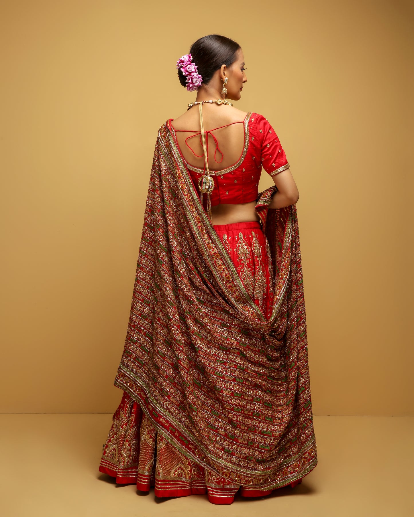 Red Ambi Bridal Lehenga Set With 108 Times Embroidered Ganapati Mantra: Vakratund Mahakaye